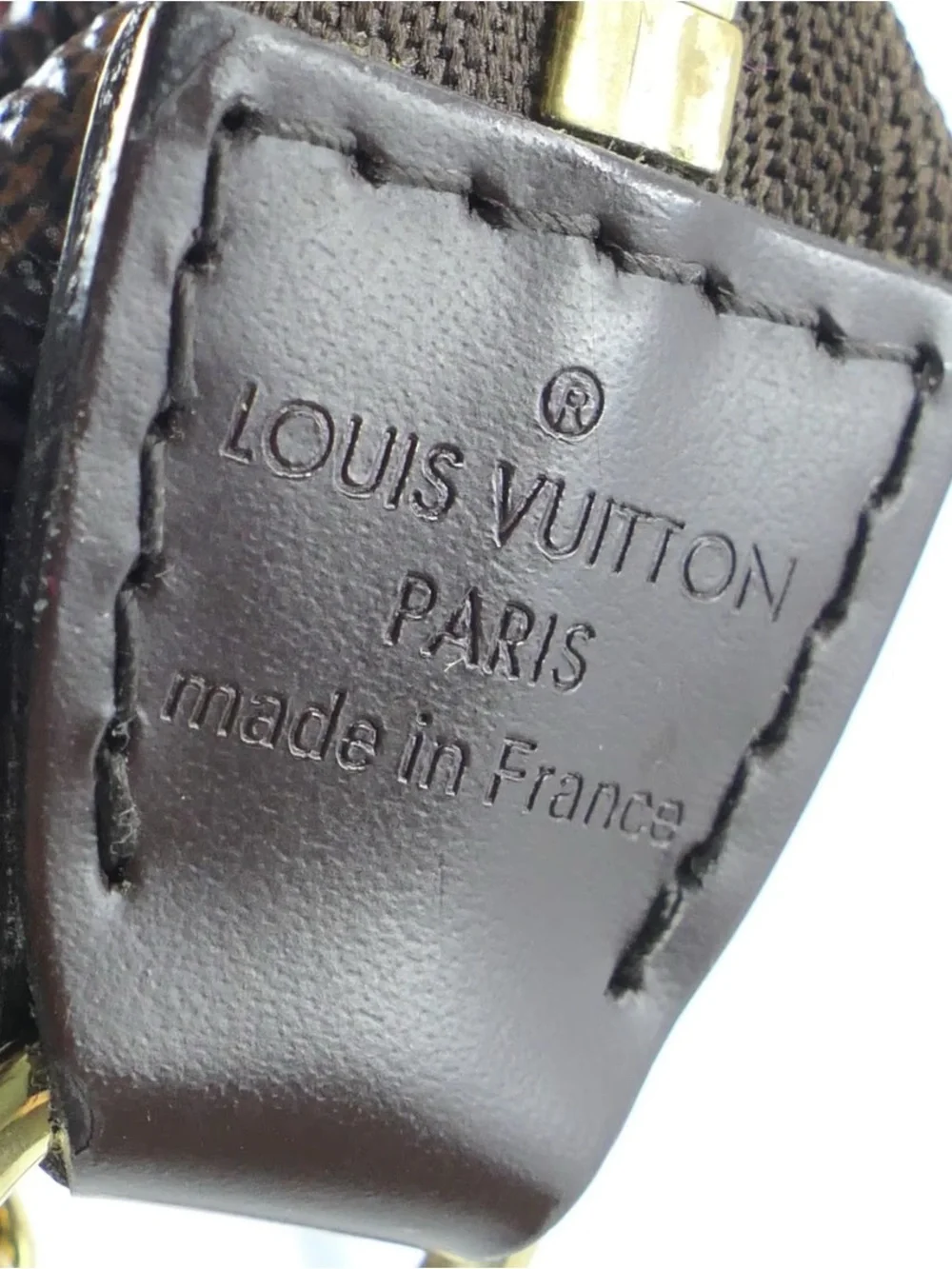 Louis Vuitton Brown Damier Ebene Mini Pochette Bag with “Trunks & Bags” Red Logo
